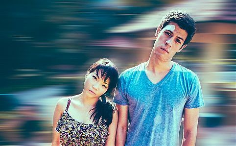 Seong Hui Xuan and Alan Wong gets dizzy as they flit between the 30 years of their characters' lives. Image courtesy of Pangdemonium! Productions.