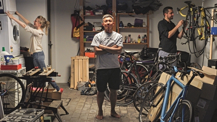 Hafiz Osman (centre) with his hosts Andrzej (right) and Evie (left) Pyrka Photo: Mike Lim