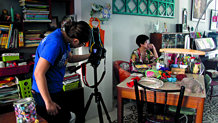 Actress Karen Tan getting her portrait taken.